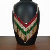 Intricate multi-colored necklace crafted entirely from brilliant-cut stones. The design features a chevron pattern of red, emerald, and clear stones transitioning into cascading gold-toned stone strands.