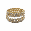 Elegant pair of two-tone gold and silver braided bangles studded with small diamonds.