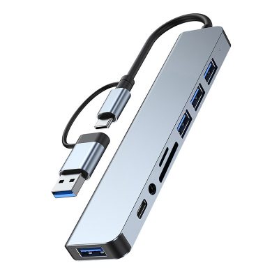 ​7-in-1 Dual Connector USB and Type-C Multi-port Hub with SD/TF Card Reader and 3.5mm Audio Jack.